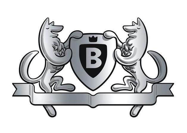 A design of An emblem, crown with animal, shield and letter b in the centre and a banner below.