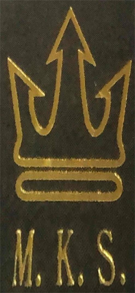 M.K.S.